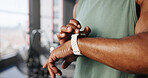 Smart watch, fitness and hands of man in gym for tracking exercise, training and workout progress. Sports, recovery and person with digital tech for wellness app, performance and stats for health