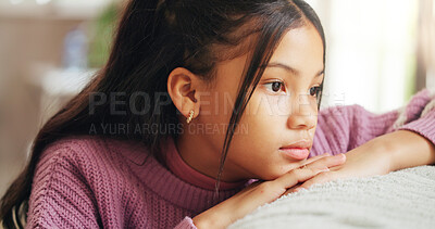 Buy stock photo Home, thinking and girl with depression, child and sad with anxiety, reflection and foster care trauma. Apartment, adoption and kid on sofa, lonely and stress with mistake, mental health or abandon