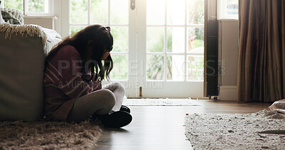 Buy stock photo Sad, child and crying on floor in home with mental health, abuse or anxiety from trauma. Crisis, unhappy and girl kid with depression from loneliness, bullying victim or emotional burnout from stress