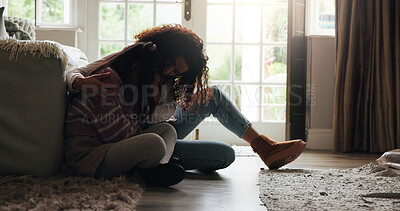 Buy stock photo Sad, child and mother with comfort in home for mental health support, mourning and grieving loss. Single parent, woman and hug girl with depression for empathy, compassion and understanding of pain
