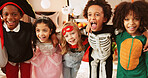 Happy, group and children with costumes at house for Halloween party, celebration and bonding. Portrait, kids and smile with character outfits for spooky season, cosplay holiday and friends together
