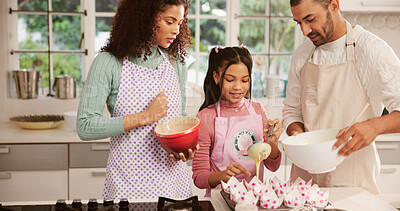 Buy stock photo Baking, happy and kid with parents in kitchen for learning, bonding or development in home. Smile, cooking and girl child with mother and father for preparing dessert together on weekend in house.