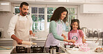 Baking, daughter or learning with mother and father in kitchen of home together for pastry recipe. Cooking, ingredients and utensils with parents teaching girl child how to bake in apartment