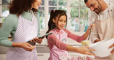 Buy stock photo Baking, happy and child with parents in kitchen for learning, bonding or development in home. Smile, cooking and girl kid with mother and father for preparing dessert together on weekend in house.