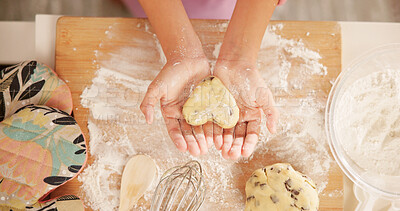Buy stock photo Baking, hands and heart with person in kitchen for development, learning or recipe from above. Dough, flour and ingredients with palms of child in home apartment for cooking or how to bake pastry