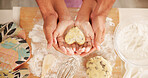 Baking, hands and heart with family in kitchen together for development, learning or recipe from above. Dough, ingredients and shape with parent teaching child how to bake in apartment for cooking