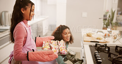 Buy stock photo Baking, mother and girl in kitchen, oven and bonding together with hobby, teaching and recipe. Home, happy family or mama with daughter, parent or ingredients with skills, child development or safety