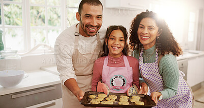 Buy stock photo Cookies, baking and portrait of child with parents in kitchen for learning, skills or development. Smile, baker and girl kid with mom and dad for biscuits or dessert together on weekend in home.