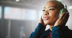 Fitness, headphones and thinking with black woman in gym for sports, training or workout motivation. Exercise, music and vision with serious African athlete on space for start of wellness routine