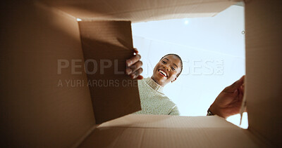 Buy stock photo Black woman, open box and smile with POV in home, low angle or ecommerce for product, order or delivery. Person, excited and happy with cardboard package, shipment and online shopping at apartment