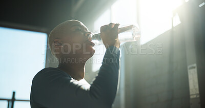 Buy stock photo Woman, fitness and drinking with water bottle for hydration, recovery or break in gym. Active, female person or thirst with natural mineral liquid for rest, performance or energy in health club