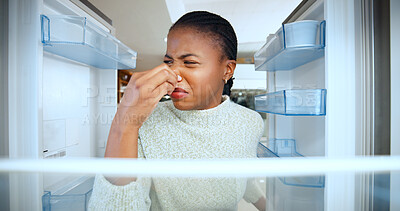 Buy stock photo Woman, cover nose and stink at fridge door, disgust and stress for dirt, germs or bacteria in home. African person, thinking and search for odor, bad smell and pov with refrigerator at apartment