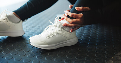 Buy stock photo Person, hands and shoes with pain in gym for injury, joint inflammation or fibromyalgia. Closeup, sore ankle or sprain with sneaker or pressure for accident, muscle tension or strain in health club