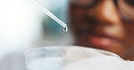 Hand, scientist and petri dish with dropper for research, experiment or lab test with exam. Science, chemistry and person with pipette for liquid chemical, medical development or pharma study closeup
