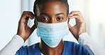 Mask, nurse and portrait of black woman in hospital for protection, hygiene and prevention. Healthcare, medical service and face of person with ppe for safety from bacteria, germs and infection