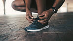 Hands, tie laces and sneakers for running, fitness or cardio health in city with start or ready outdoor. Runner, person prepare shoes or footwear for training, workout or exercise in urban town