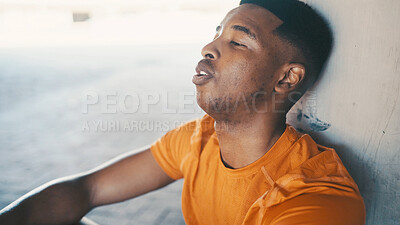 Buy stock photo Tired, fitness and black man in city, rest and break with wellness, recovery and exercise. Outdoor, relax and African person with training, healthy and exhausted with workout, fatigue and breathing
