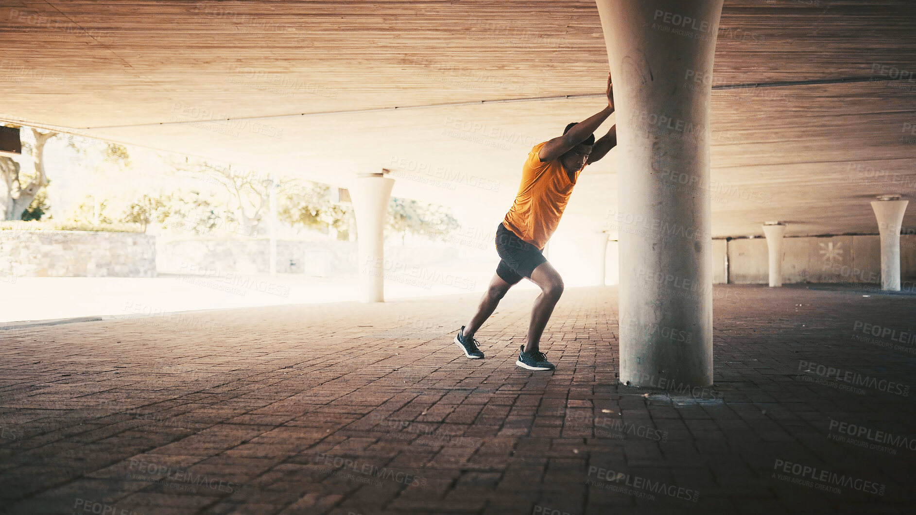 Buy stock photo Black man, city and stretching for fitness, warm up and road for cardio preparation. African person, urban space and athlete for sports, workout and getting ready for exercise or activity outdoor