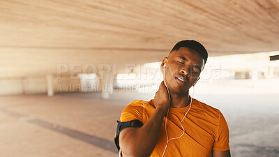 Buy stock photo Fitness, black man and neck pain injury outdoor with tension, workout strain and exercise. Athlete, person and muscle discomfort with earphones from training, cramps or inflammation in parking space