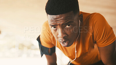 Buy stock photo Portrait, black man and breathing with earphones for fatigue, fitness or intense training in city. Tired, male person or rest with break for workout, exercise or physical activity in an urban town
