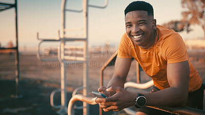 Buy stock photo Portrait, fitness and man with smartphone, outdoor gym or smile for exercise, athlete and training. Happy, black person and research workout tips on mobile app, healthy and wellness in Nigeria