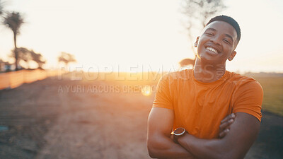 Buy stock photo Portrait, fitness and man with arms crossed, outdoor or break for athlete, workout routine or flare. Space, runner and black person with smile for exercise, rest and wellness with pride in Nigeria