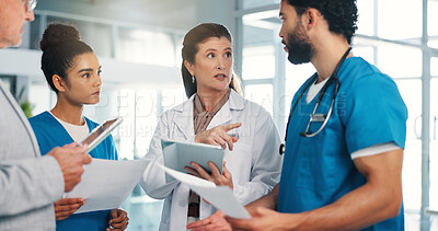Buy stock photo Woman, doctors and team with tablet, discussion and planning for healthcare services at hospital. Leader, group and talk with tech, documents or application with insight for medical report at clinic