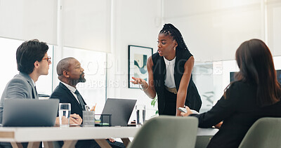 Buy stock photo Woman, talk and meeting with staff in office for discussion, planning and ideas for proposal. Speaker, explaining and people listening for company pitch, team performance and feedback for development