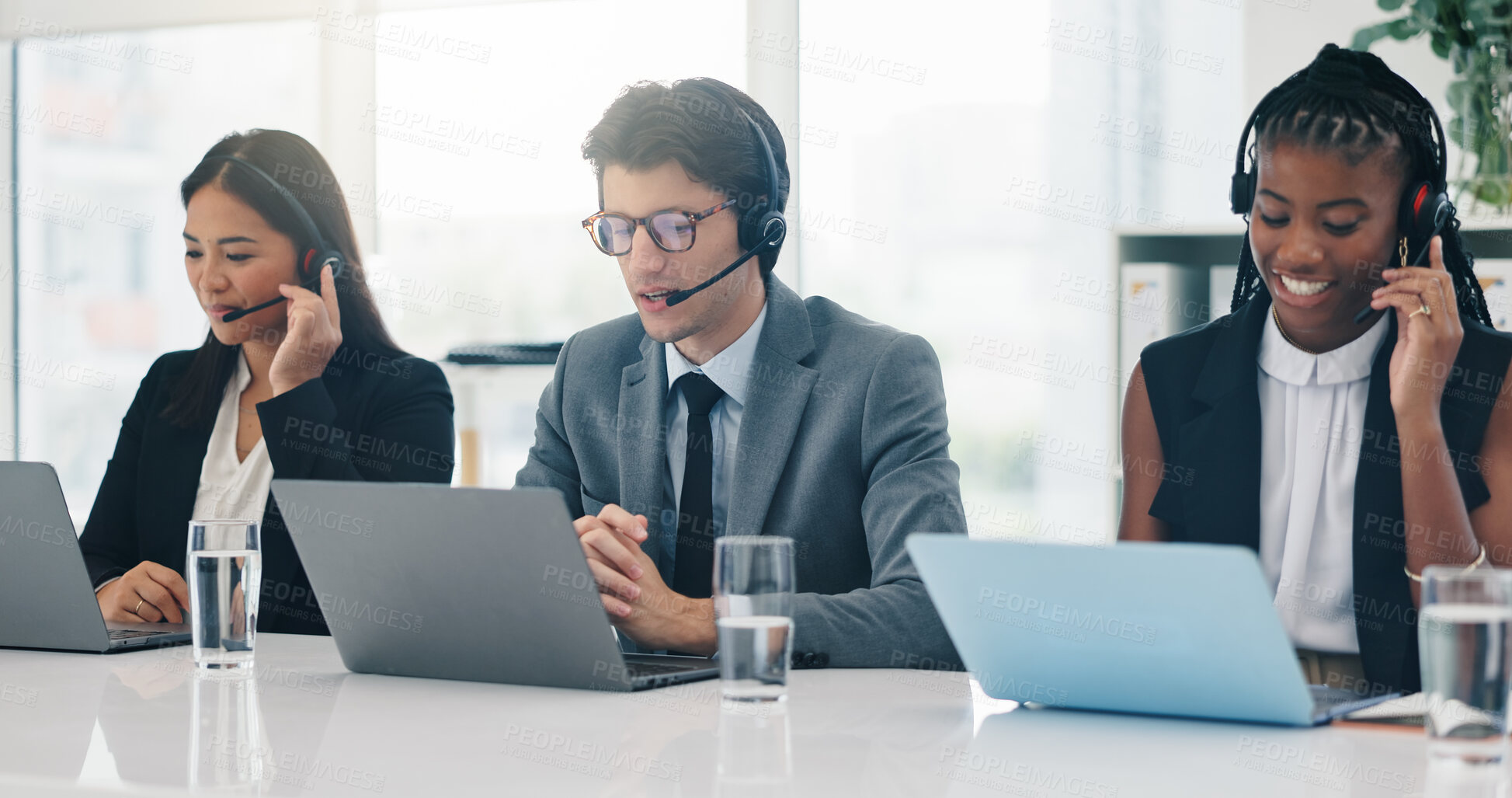 Buy stock photo Consulting, headset and laptop with business people in call center for financial advice or feedback. Computer, customer support and finance with employee team at desk in workplace for help or service
