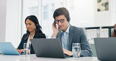 Buy stock photo Headset, team and man with laptop in call center for online help, lead generation or sales processing. Telemarketing, friendly agent and microphone for customer support, product advice and coworking