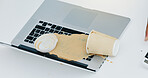 Laptop, coffee cup and spill beverage in office for accident, work chaos and keyboard damage. Takeaway, pc or mess drink on tech with clumsy person, electronic insurance and hazard of liquid disaster