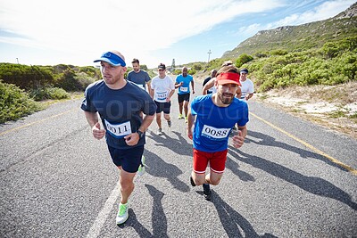 Buy stock photo People, running competition and marathon for fitness, cardio challenge and road for endurance. Athletes, contest and community for workout in nature, international tournament and outdoor sports