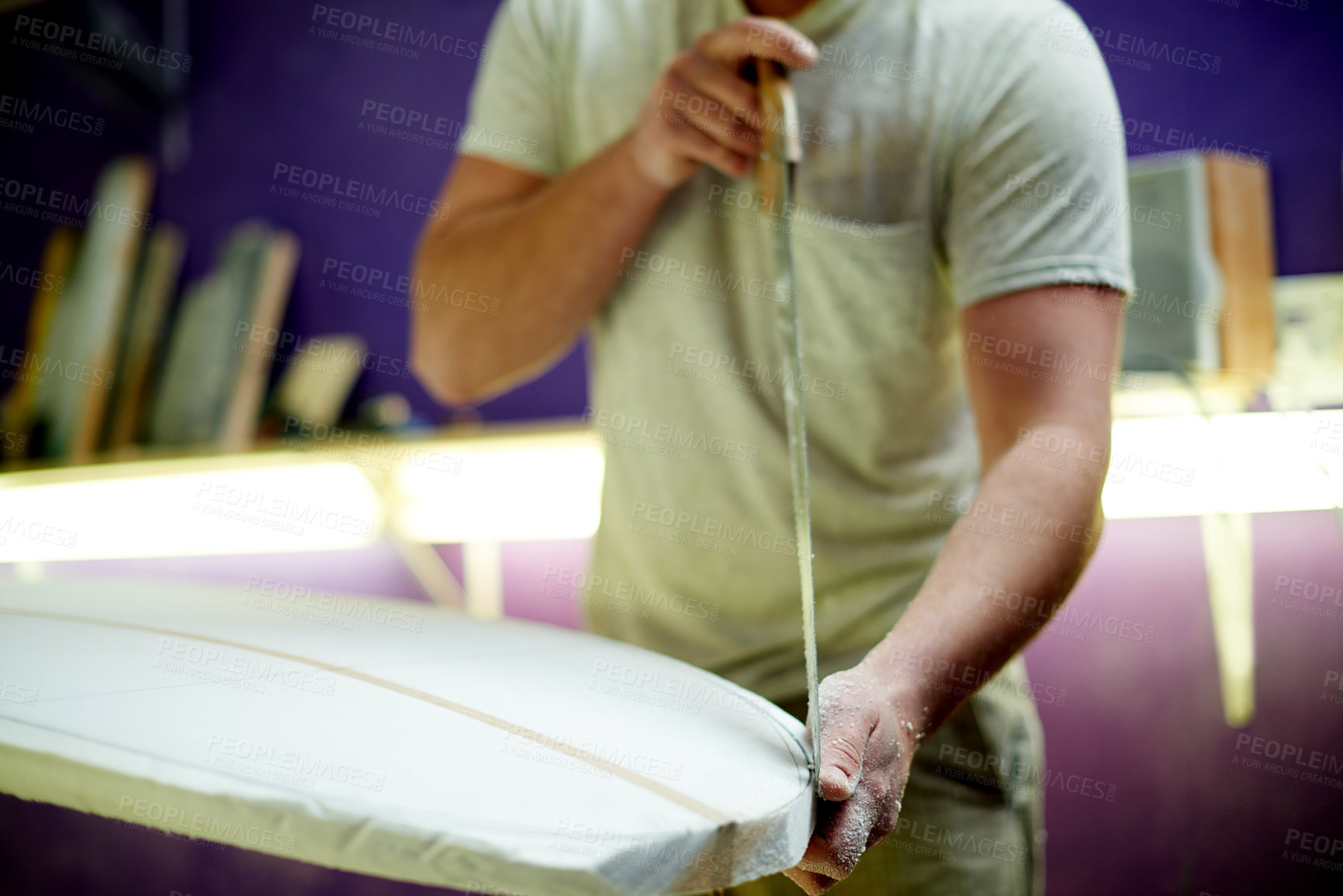 Buy stock photo Hands, man and carving surfboard with tools for custom design, shaping guide and repair work. Male person, cutting equipment and board with craft process, diy restoration and manufacturing precision
