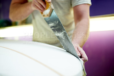 Buy stock photo Hands, person and cutting surfboard in workshop for custom design, shaping guide and repair work. Worker, carving equipment and board for crafting process, diy restoration and manufacturing precision