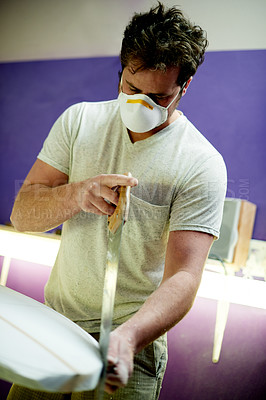 Buy stock photo Shaping, surfboard and man with saw, workshop or process for manufacturing with tool and maintenance. Small business, equipment and person with mask for dust protection, restoration and craftsmanship