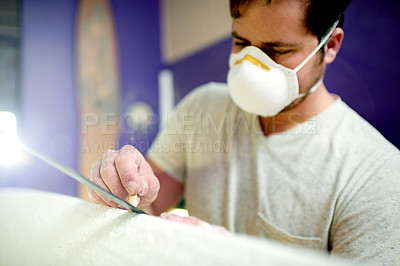 Buy stock photo Man, face mask and chalk for carving on surfboard for measure design, shaping guide and repair work. Male person, marking tool and board for crafting process, diy restoration and manufacturing hobby