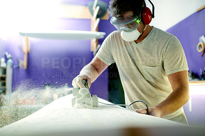 Buy stock photo Artisan, sanding and person in workshop with surfboard, smoothing and working in industry. Production, startup and man in manufacturing with face mask, polish and repair for hand made product.