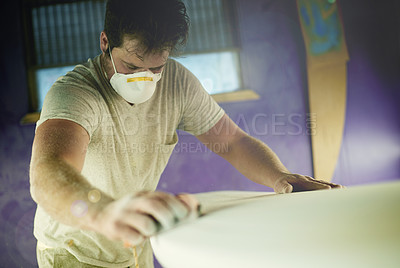 Buy stock photo Surfboard, man and sanding in workshop for manufacturing, design or polish. Surf, person and tools to shape blank with block, smooth and production process with dust on foam for creative handcraft