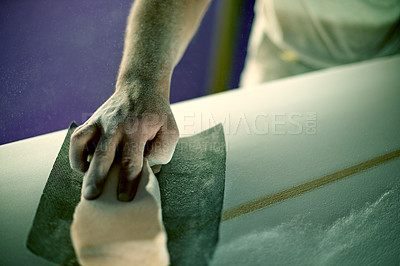 Buy stock photo Hands, person and sanding surfboard with tools to smooth surface, shaping process and repair work. Worker, dust and material for diy restoration, board maintenance and polish craft to prepare finish