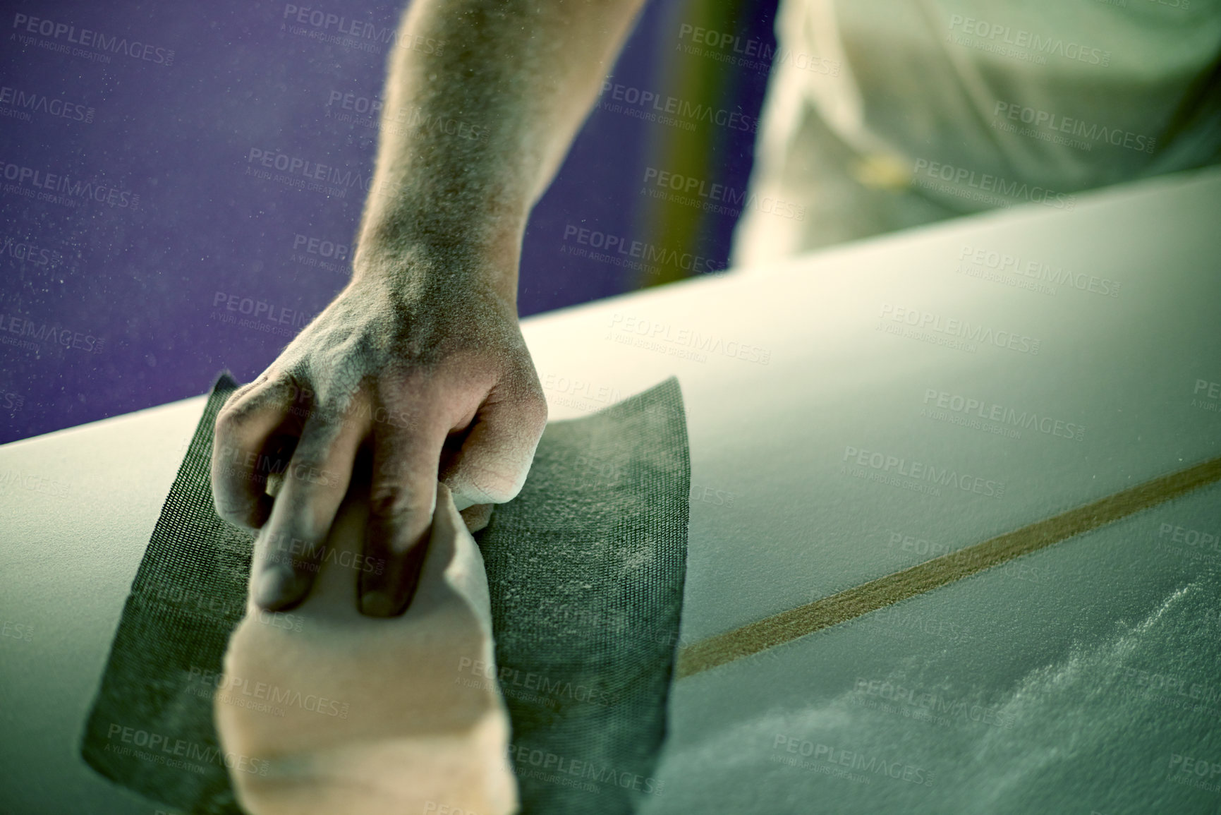 Buy stock photo Hands, person and sanding surfboard with tools to smooth surface, shaping process and repair work. Worker, dust and material for diy restoration, board maintenance and polish craft to prepare finish
