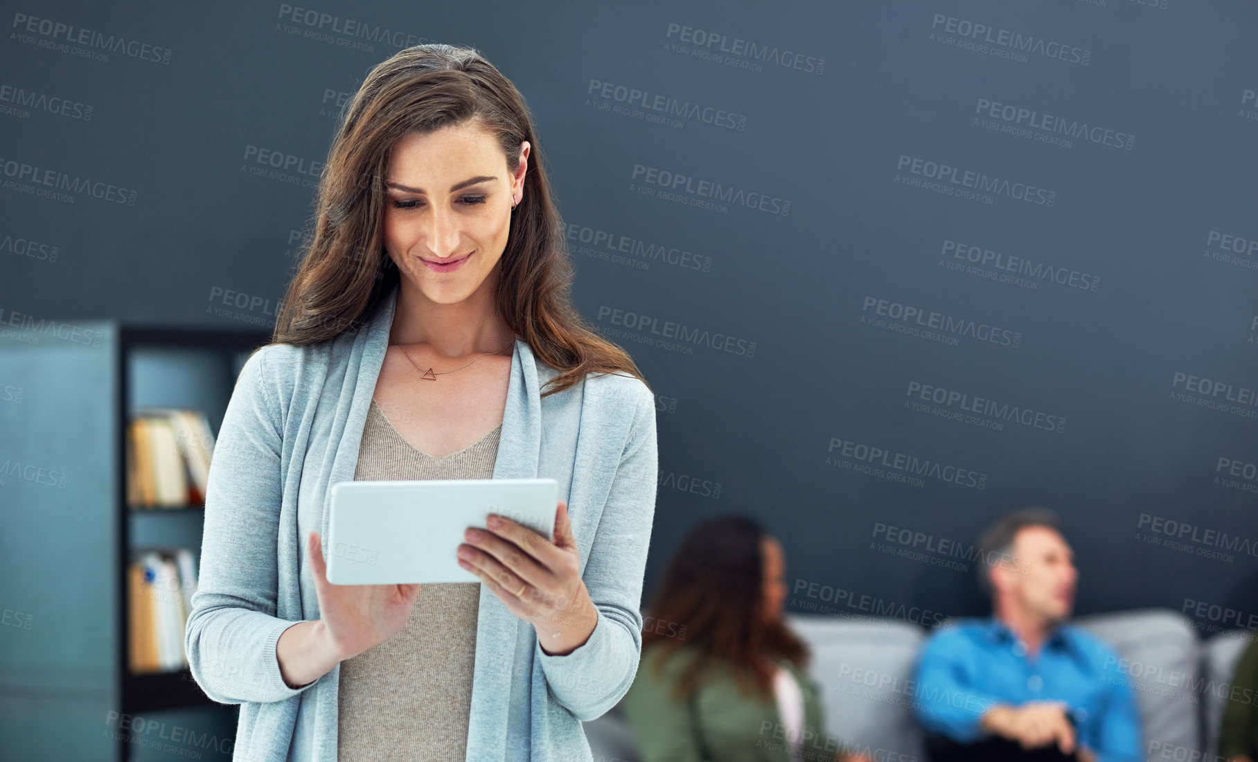 Buy stock photo Meeting, reading and woman in office with tablet, space and career pride for startup growth. Smile, team and project manager in workplace with tech, support or research for small business development