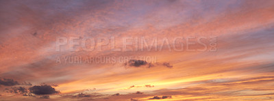 Buy stock photo Sunset, orange and sky with clouds for background, aesthetic and natural beauty. Nature, atmosphere and cloudy space with sunshine for evening, dusk and light for weather, scenic view or pattern