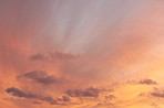 Sunrise, orange and sky with clouds for background, aesthetic and natural beauty. Nature, atmosphere and cloudy streak with sunshine for morning, dawn and light on horizon, scenic view or skyline