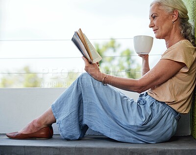 Buy stock photo Wellness, reading book and senior woman on patio for relax, coffee and morning in apartment. Herbal tea, calm or zen and fiction novel or story in home for fantasy, retirement or happy on balcony