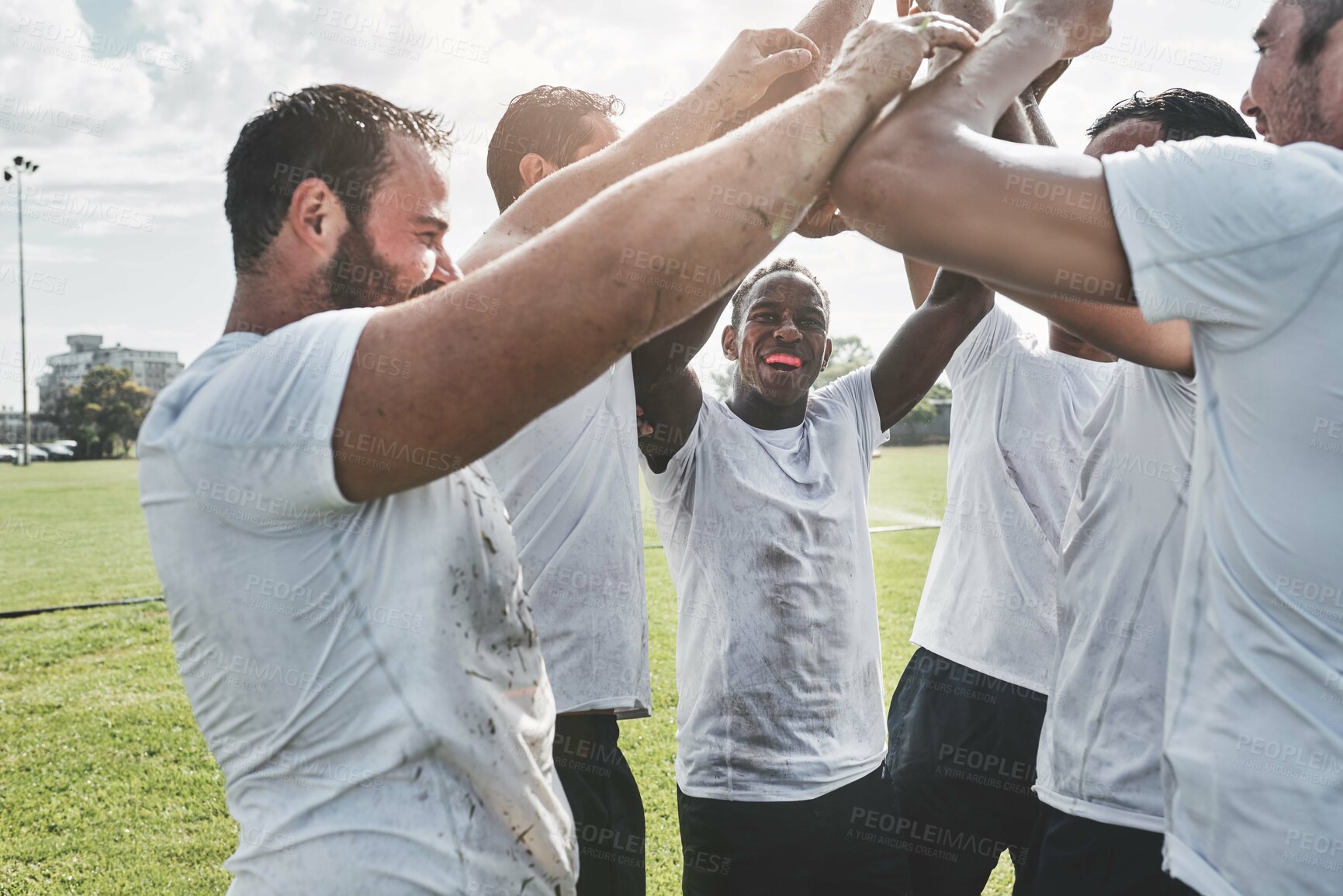 Buy stock photo Huddle, rugby success and men in celebrate teamwork, achievement or winning game in match. Champion, sports tournament competition or group of players in field or outdoor stadium for score or goals
