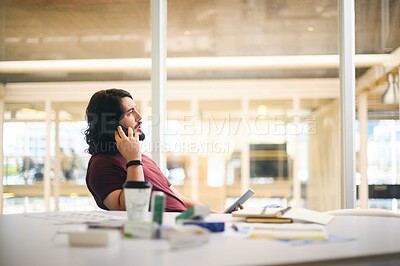 Buy stock photo Businessman, talking and phone call with tablet in office for communication, networking and discussion. Digital designer, person and contact for content review, planning and social marketing campaign