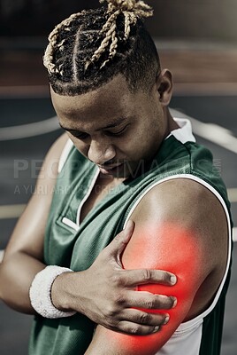 Buy stock photo Fitness, basketball and black man with sports injury in need of first aid or physiotherapy during game. Sportsman from Nigeria with hand on arm, muscle pain and medical emergency on basketball court.
