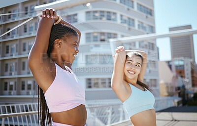 Buy stock photo Interracial woman, fitness friends and stretch for exercise, workout and training in the city outdoors. Happy, young and active women smile together in sports activity, stretching in a urban town