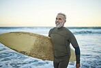 Ocean, surfing and portrait of old man at the beach in the morning. Senior man with surfboard, hand sign and smile on his face ready to surf at sunrise. Summer, hobby and retirement in Australia
