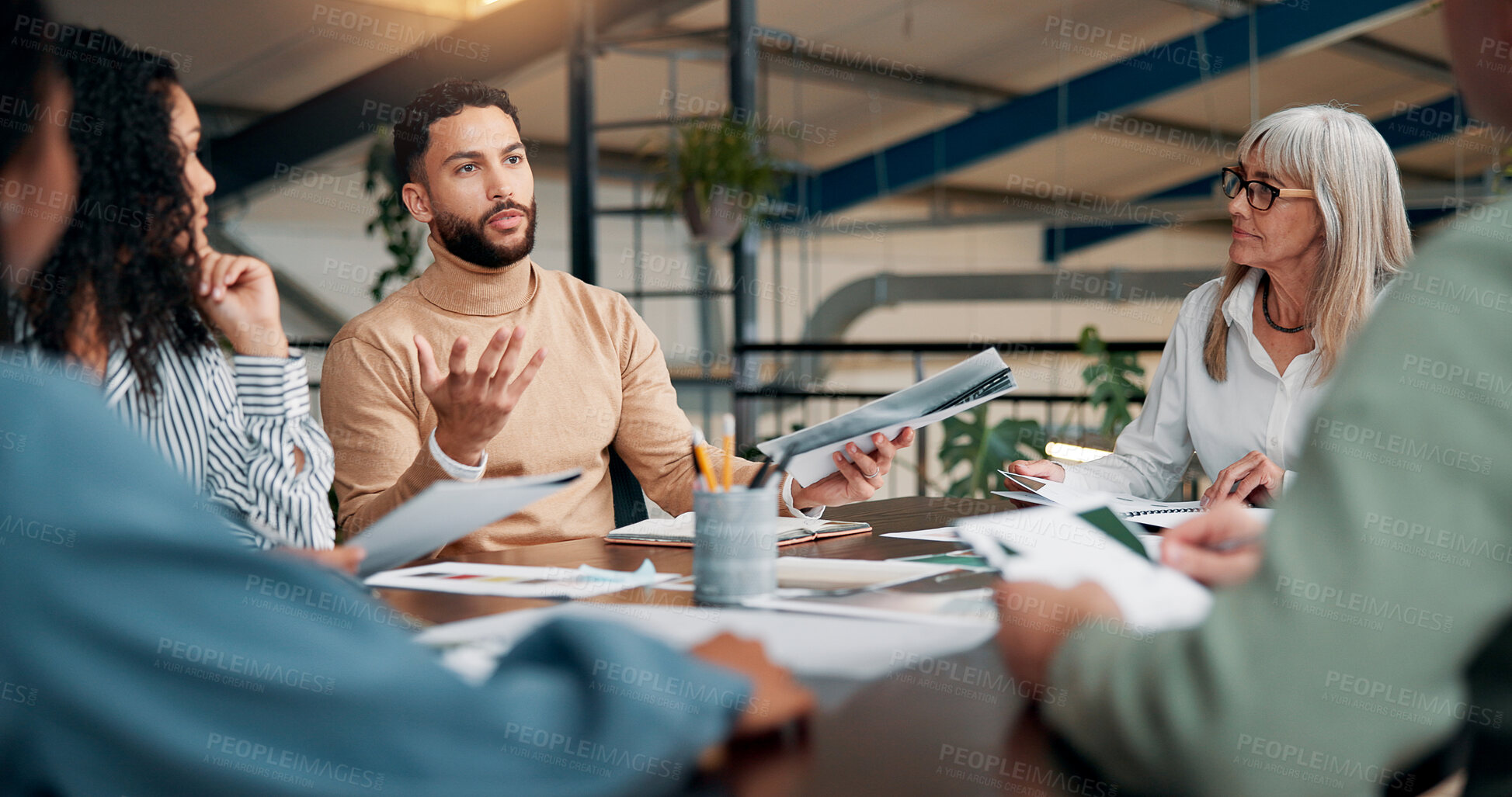 Buy stock photo Portfolio, planning or designers talking in meeting for creative project, startup or feedback. Review, interior design paperwork and people with teamwork for brainstorming, ideas or collaboration